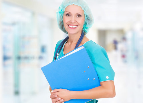 medical staff smiling while bringing a folder